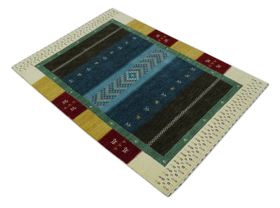 Tribal Gabbeh Blue, Gold, Maroon and Ivory Stripes design Traditional Hand loom 4.6x7 Wool Area Rug - The Rug Decor