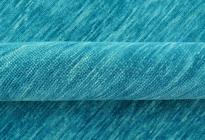 Trident Custom Made Solid Modern Blue Hand Tufted Wool Area Rug - The Rug Decor