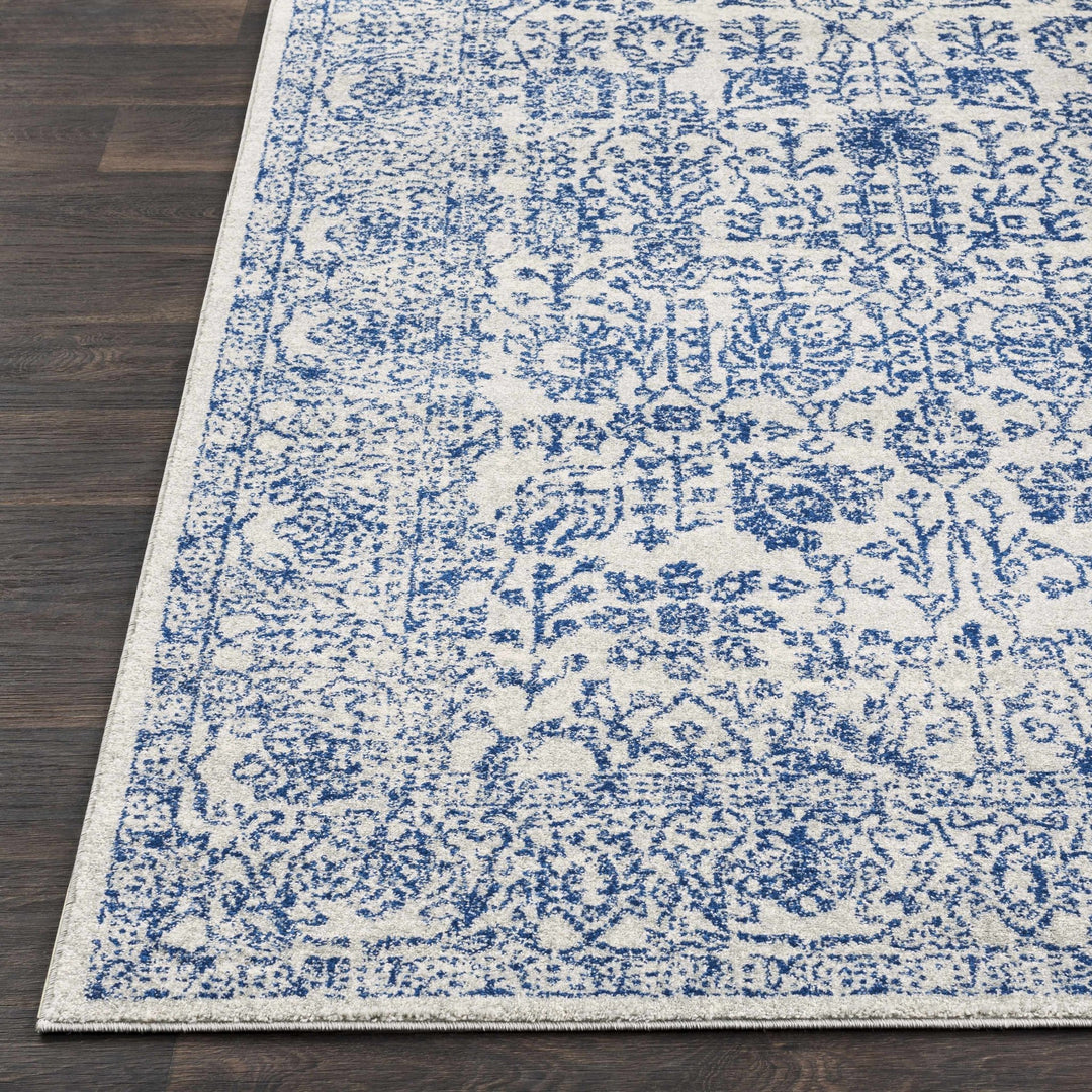 Truxton Traditional Blue And Ivory Area Rug - The Rug Decor