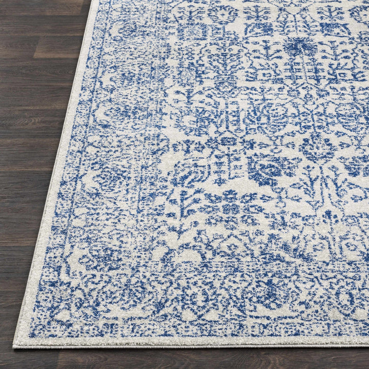 Truxton Traditional Blue And Ivory Area Rug - The Rug Decor