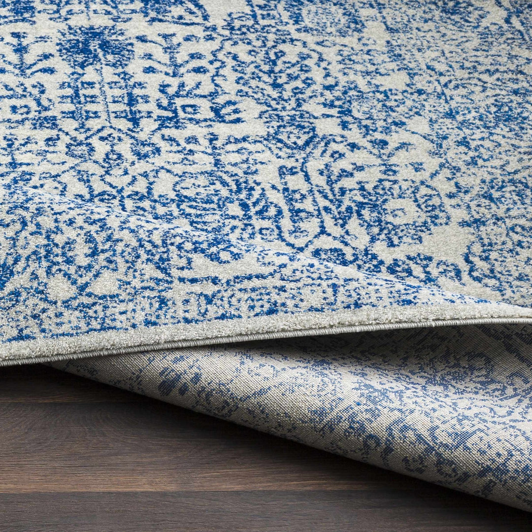 Truxton Traditional Blue And Ivory Area Rug - The Rug Decor