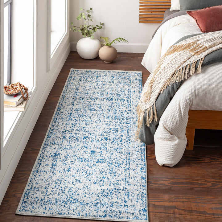 Truxton Traditional Blue And Ivory Area Rug - The Rug Decor