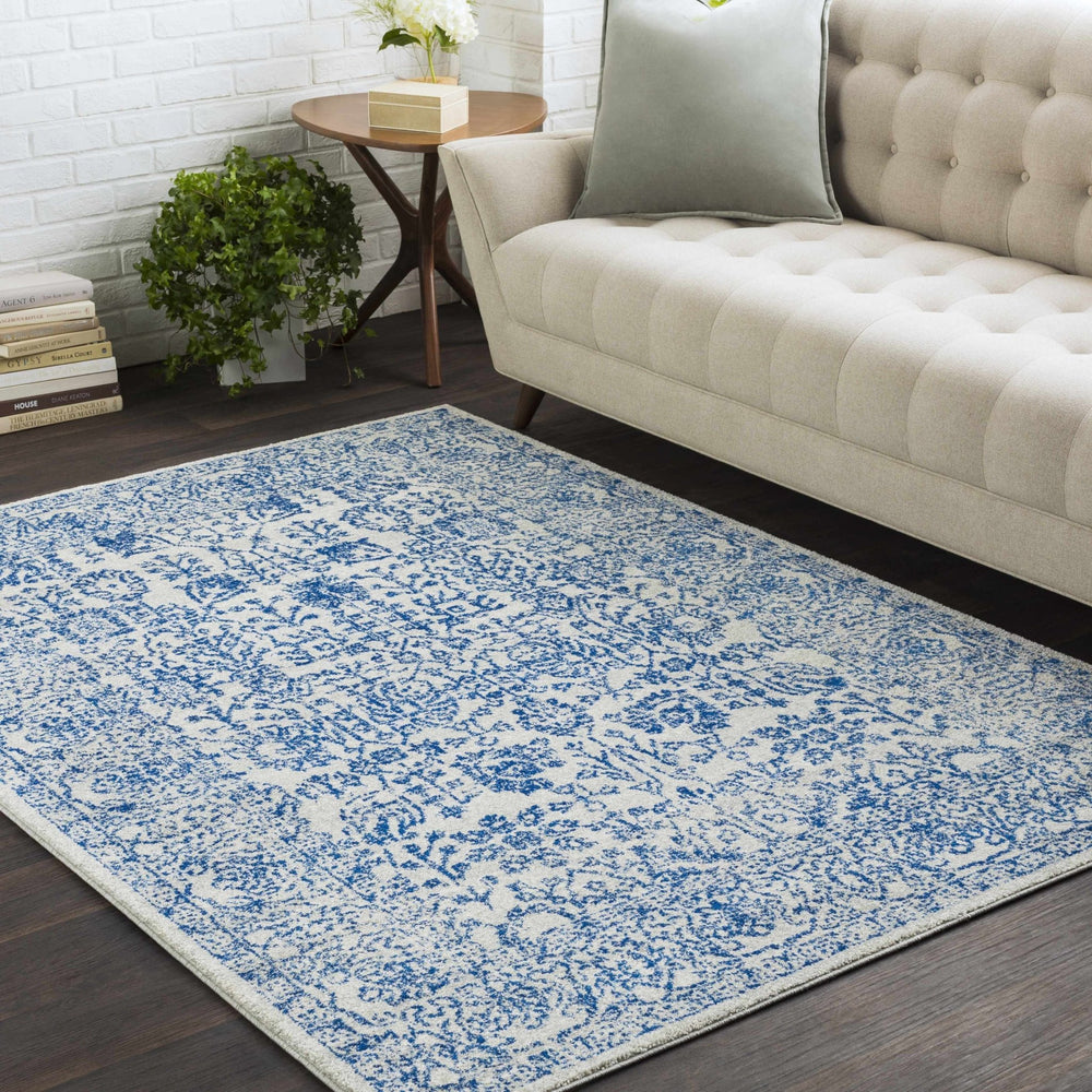 Truxton Traditional Blue And Ivory Area Rug - The Rug Decor