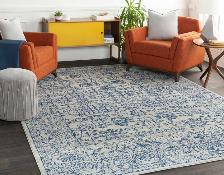 Truxton Traditional Blue And Ivory Area Rug - The Rug Decor