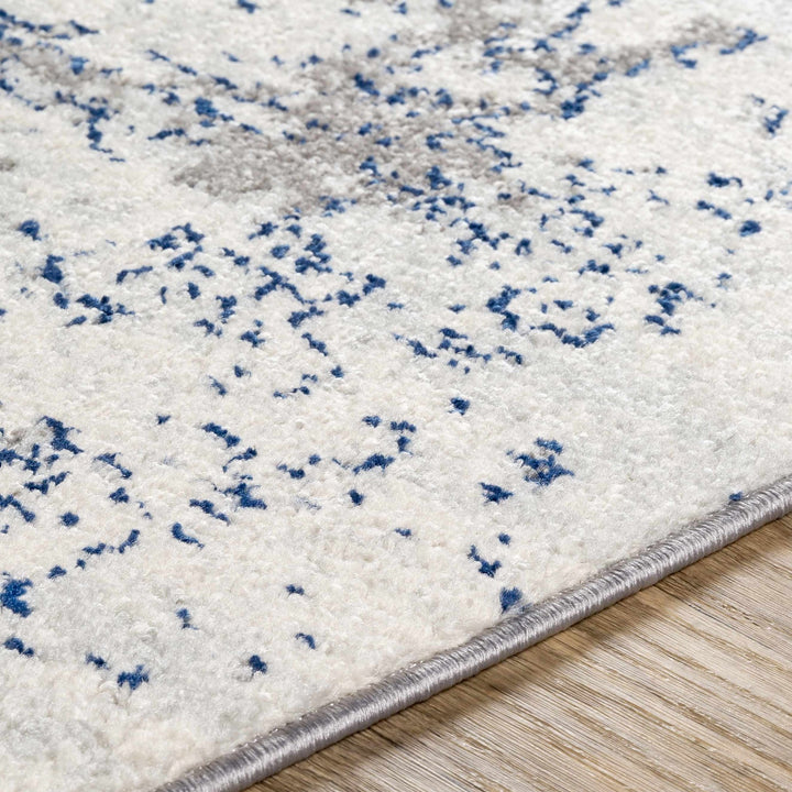 Warburton Ivory And Blue Modern Abstract Area Rug - The Rug Decor