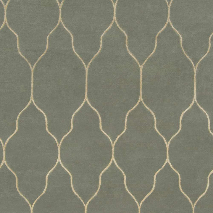 Gray hand-knotted rug closeup with light trellis geometric pattern