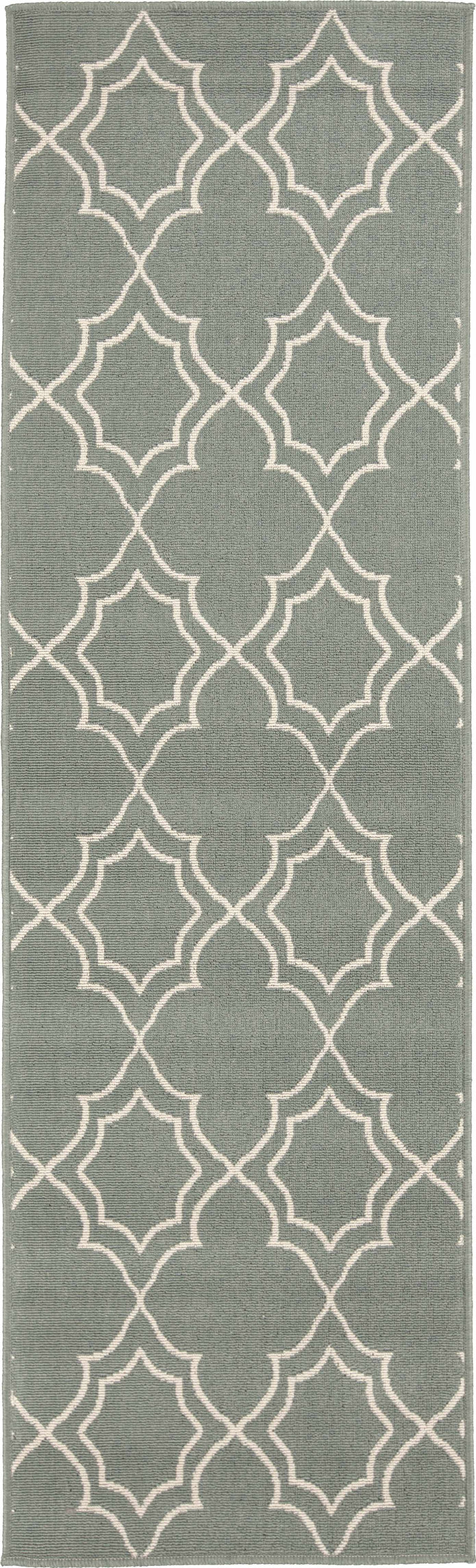 Runner-style green area rug with repeating beige trellis quatrefoil geometric pattern