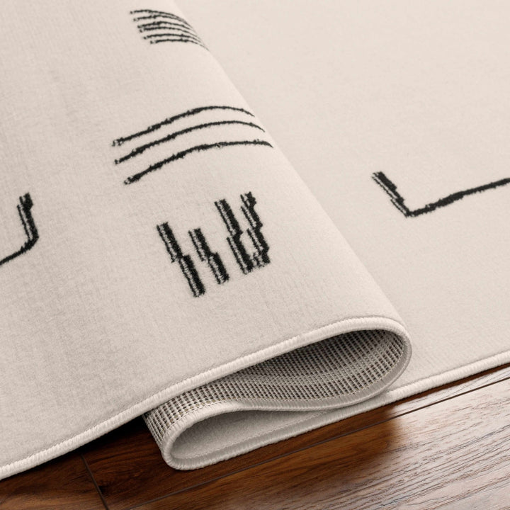 Zale Modern Abstract Design Cream And Black Area Rug - The Rug Decor