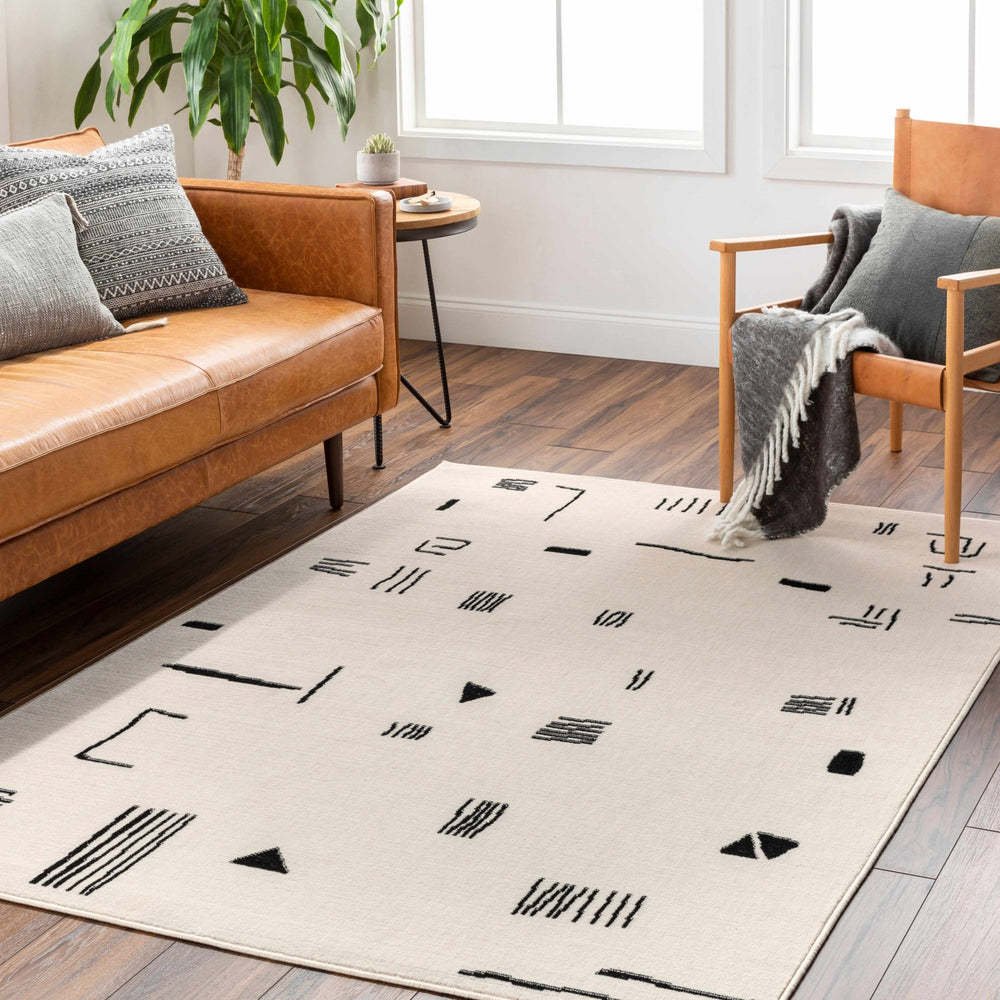 Zale Modern Abstract Design Cream And Black Area Rug - The Rug Decor