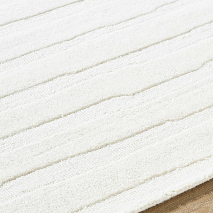 Zerah Ivory Contemporary Hand Tufted Wool Area Rug - The Rug Decor