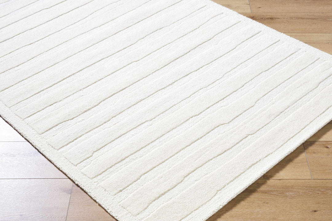 Zerah Ivory Contemporary Hand Tufted Wool Area Rug - The Rug Decor
