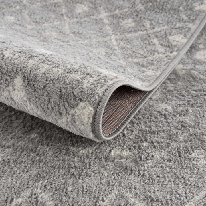 Contemporary Gray and Ivory Low pile Tribal Design Area Rug - The Rug Decor