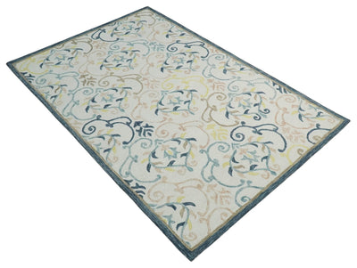 Hand Tufted Ivory Teal, and Brown Traditional Ikat Pattern wool Rug - The Rug Decor