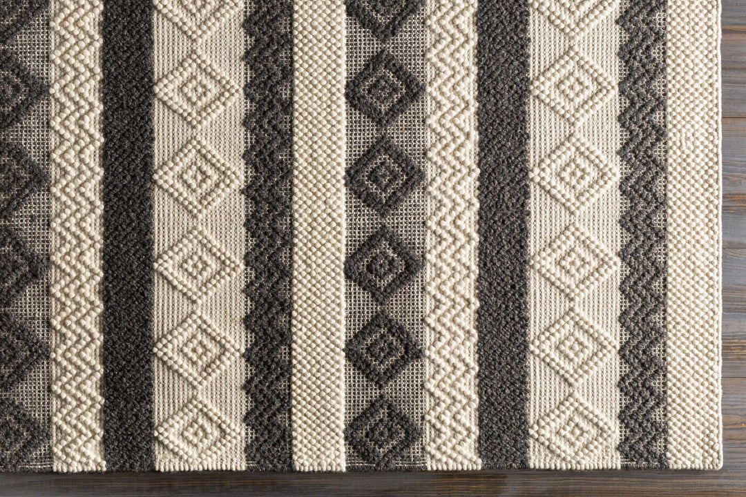Hand Woven Tribal look Ivory and Charcoal Geometrical Tasseled wool Area Rug - The Rug Decor