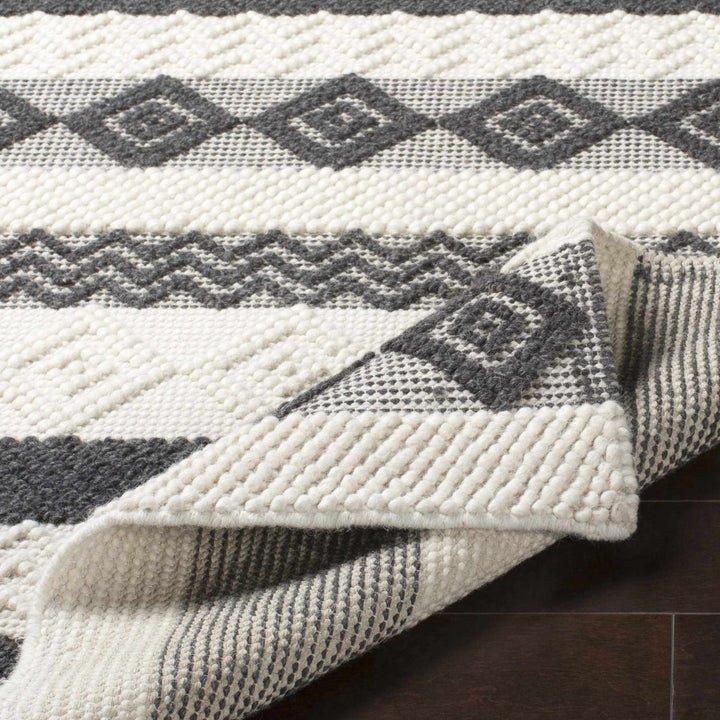 Hand Woven Tribal look Ivory and Charcoal Geometrical Tasseled wool Area Rug - The Rug Decor