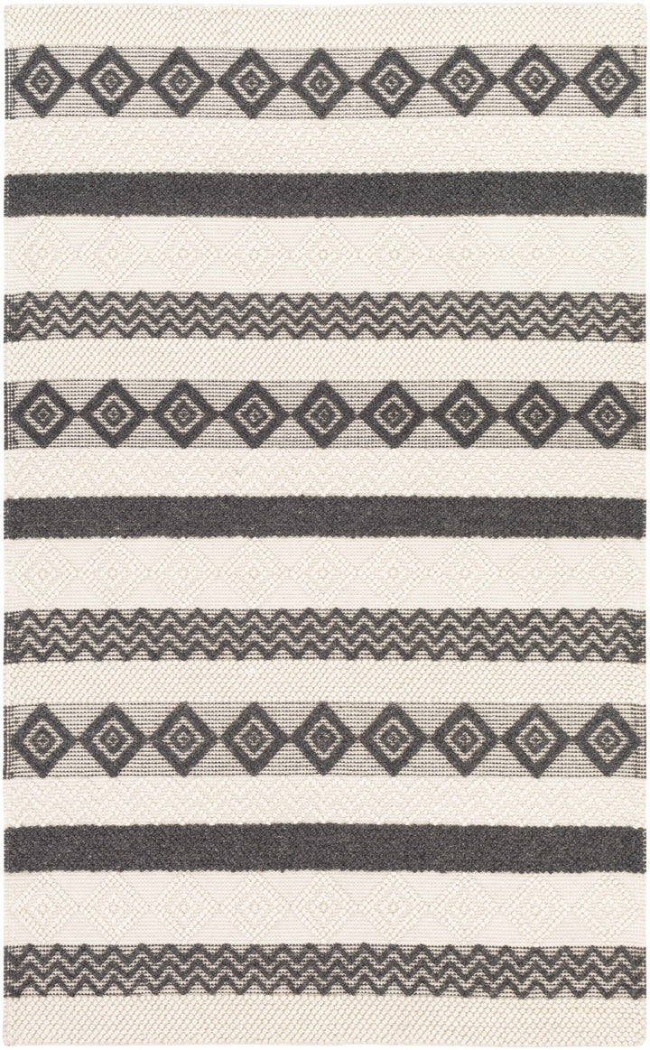 Hand Woven Tribal look Ivory and Charcoal Geometrical Tasseled wool Area Rug - The Rug Decor