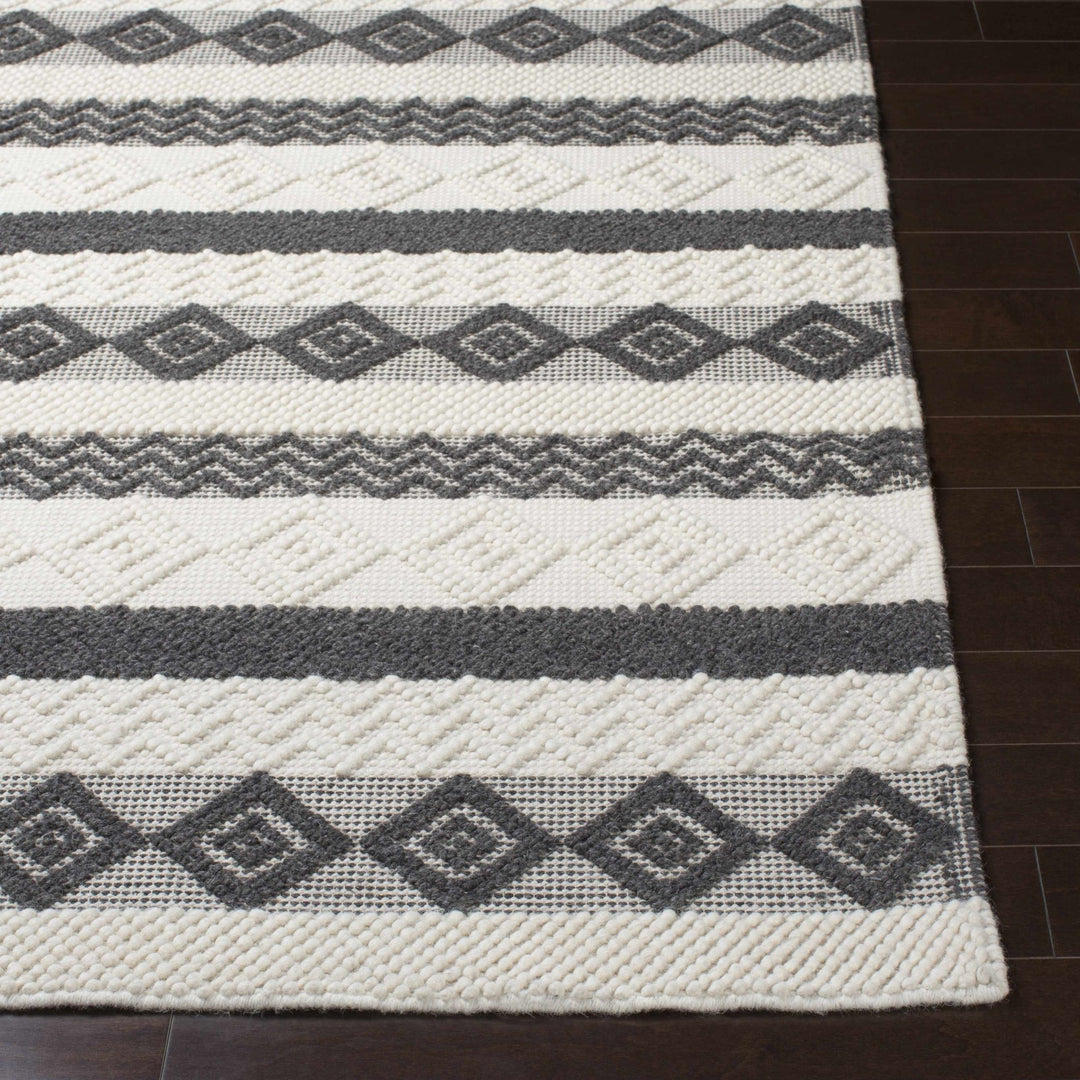 Hand Woven Tribal look Ivory and Charcoal Geometrical Tasseled wool Area Rug - The Rug Decor
