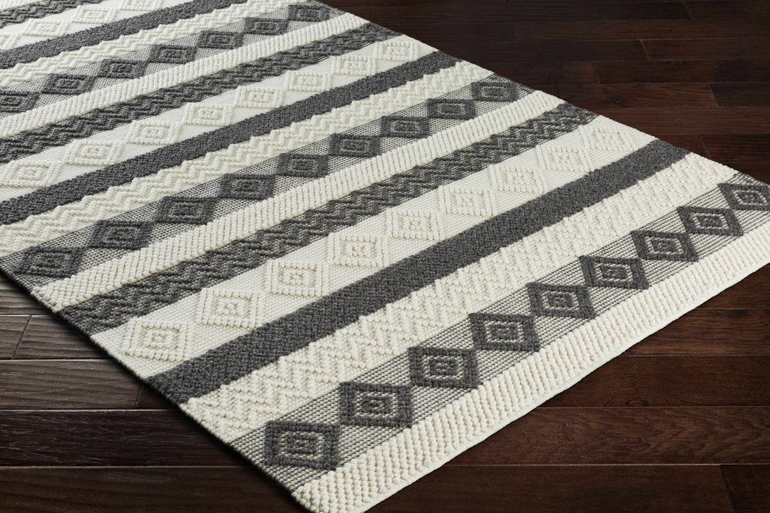 Hand Woven Tribal look Ivory and Charcoal Geometrical Tasseled wool Area Rug - The Rug Decor