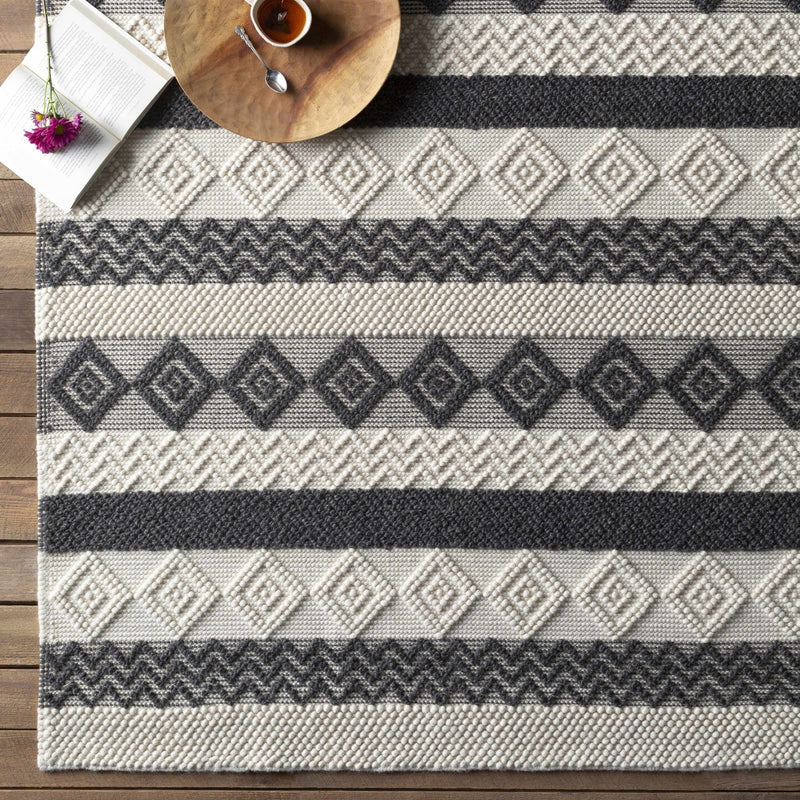 Hand Woven Tribal look Ivory and Charcoal Geometrical Tasseled wool Area Rug - The Rug Decor