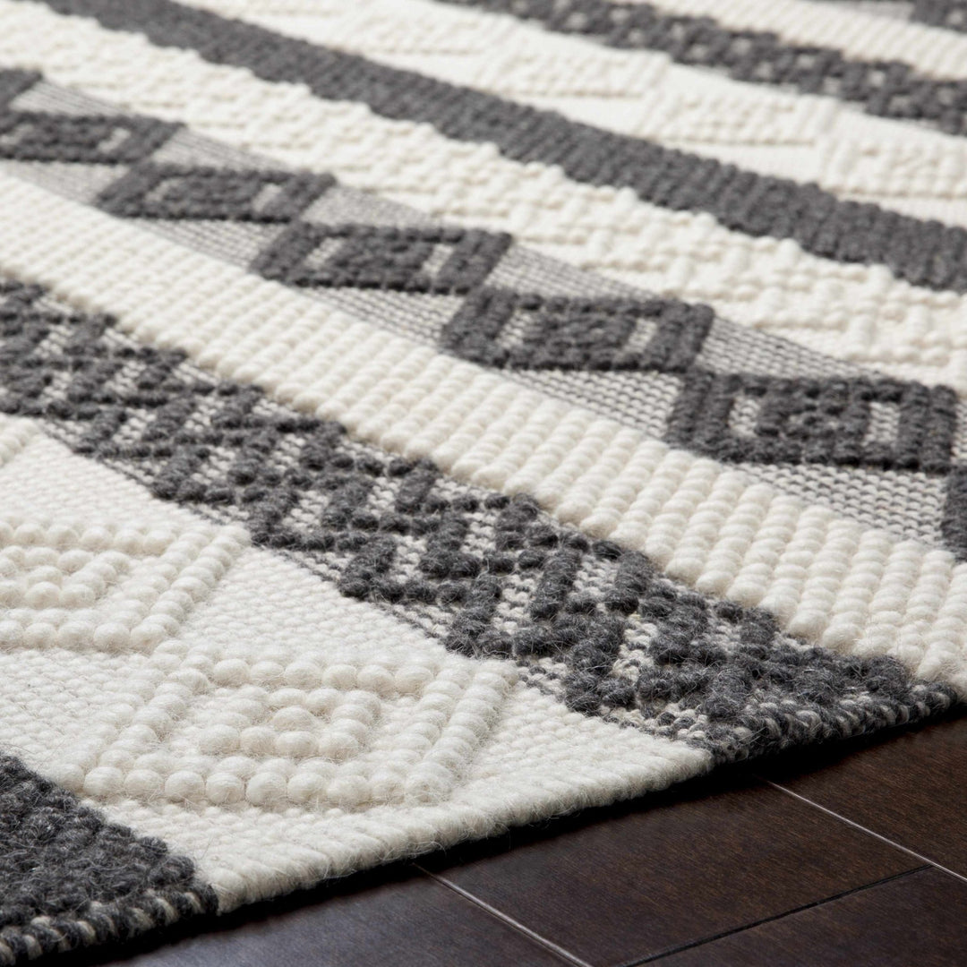 Hand Woven Tribal look Ivory and Charcoal Geometrical Tasseled wool Area Rug - The Rug Decor