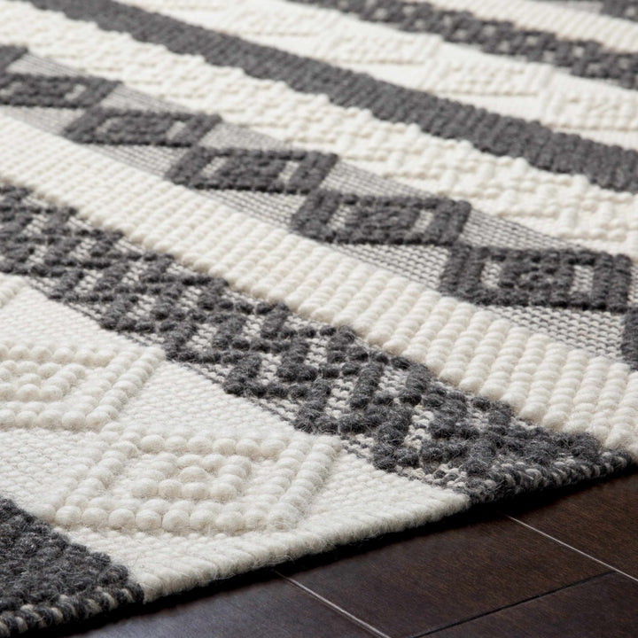 Hand Woven Tribal look Ivory and Charcoal Geometrical Tasseled wool Area Rug - The Rug Decor
