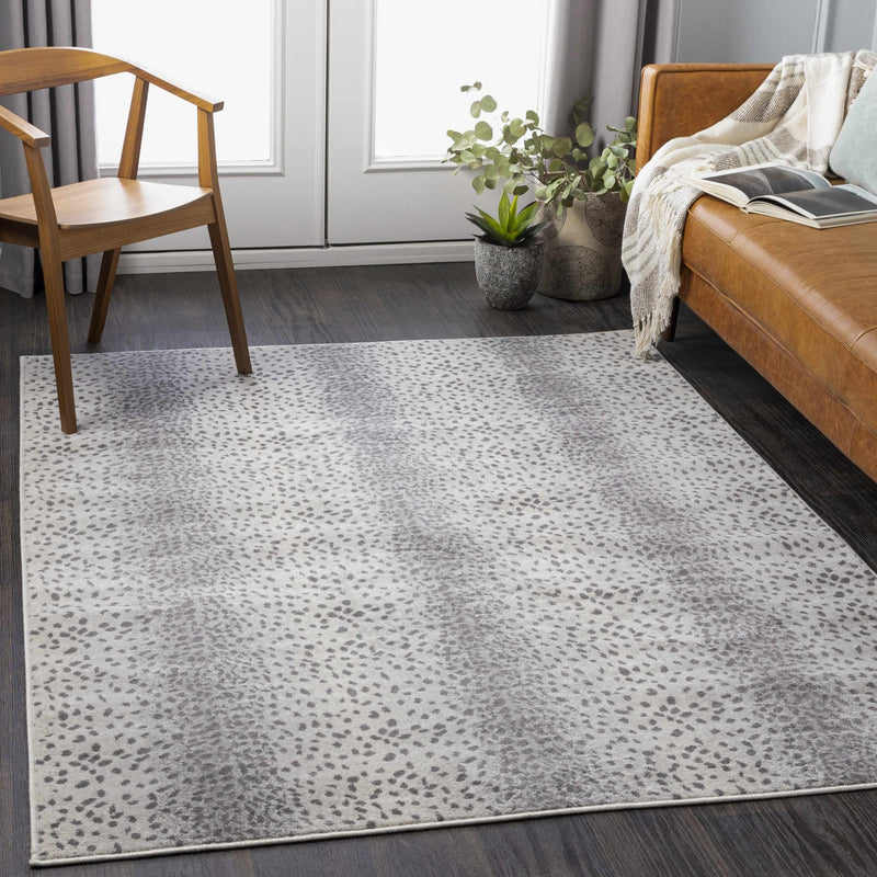 Modern Contemporary Ivory and Charcoal Leopard Print Low Pile Area Rug - The Rug Decor