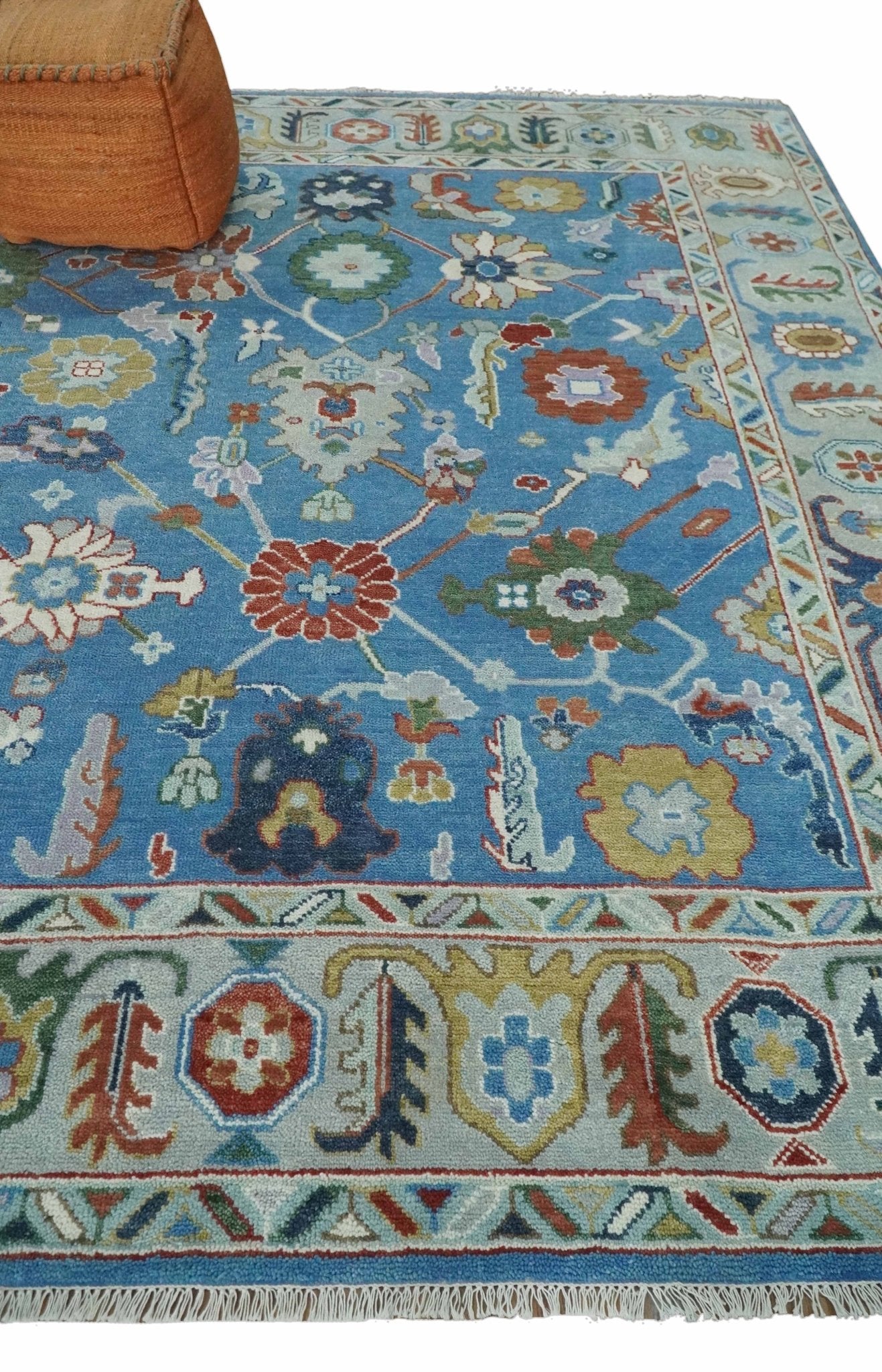 https://therugdecor.com/cdn/shop/products/modern-oushak-8x10-hand-knotted-persian-blue-rust-and-ivory-colorful-wool-area-rug-trdcp848810-963906.jpg?v=1655130139