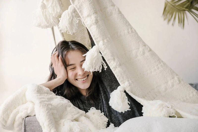 Soft And Cozy Black, White and Tan Tassel Braided Pom Pom Throw - The Rug Decor