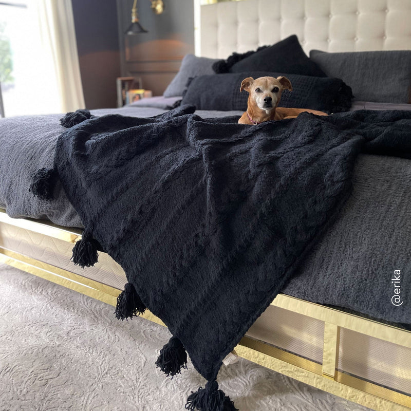 Soft And Cozy Black, White and Tan Tassel Braided Pom Pom Throw - The Rug Decor
