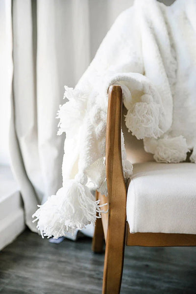 Soft And Cozy Black, White and Tan Tassel Braided Pom Pom Throw - The Rug Decor