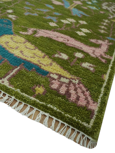 The Green Jungle Life Teal and Peach Peacock Bird Hand Knotted 8x10 Wool Area Rug - The Rug Decor