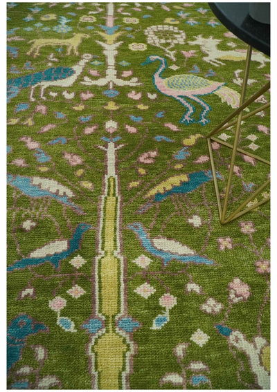 The Green Jungle Life Teal and Peach Peacock Bird Hand Knotted 8x10 Wool Area Rug - The Rug Decor