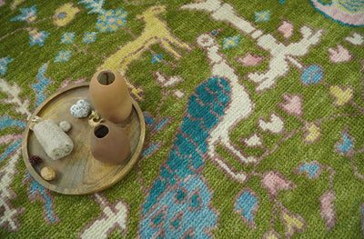 The Green Jungle Life Teal and Peach Peacock Bird Hand Knotted Custom Made Wool Area Rug - The Rug Decor