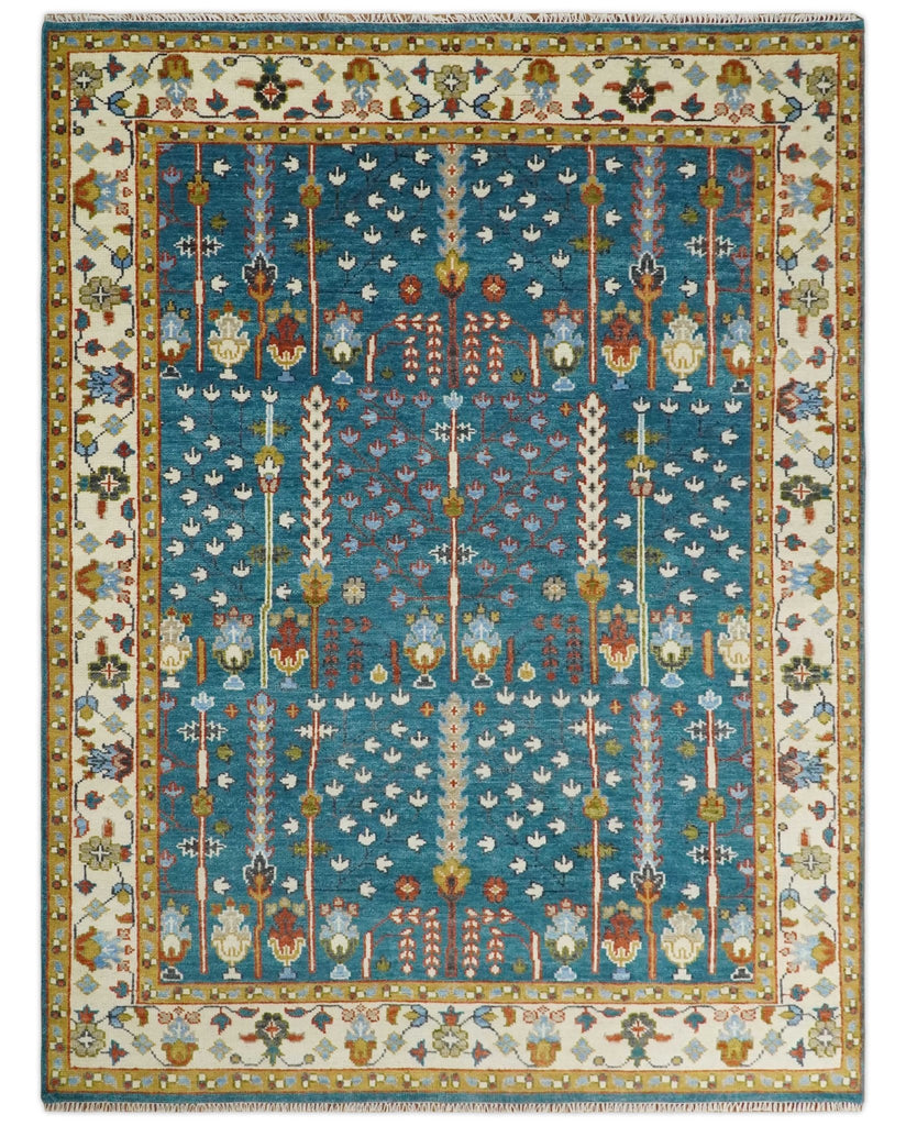 https://therugdecor.com/cdn/shop/products/tree-of-life-5x8-6x9-8x10-9x12-10x14-and-12x15-hand-knotted-teal-blue-and-ivory-traditional-persian-vintage-wool-rug-trdcp785-114299_1024x1024.jpg?v=1651496340